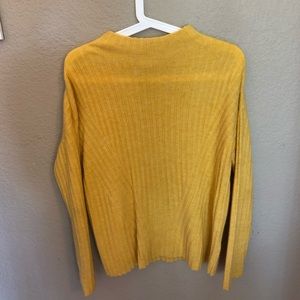 Yellow fuzzy sweater